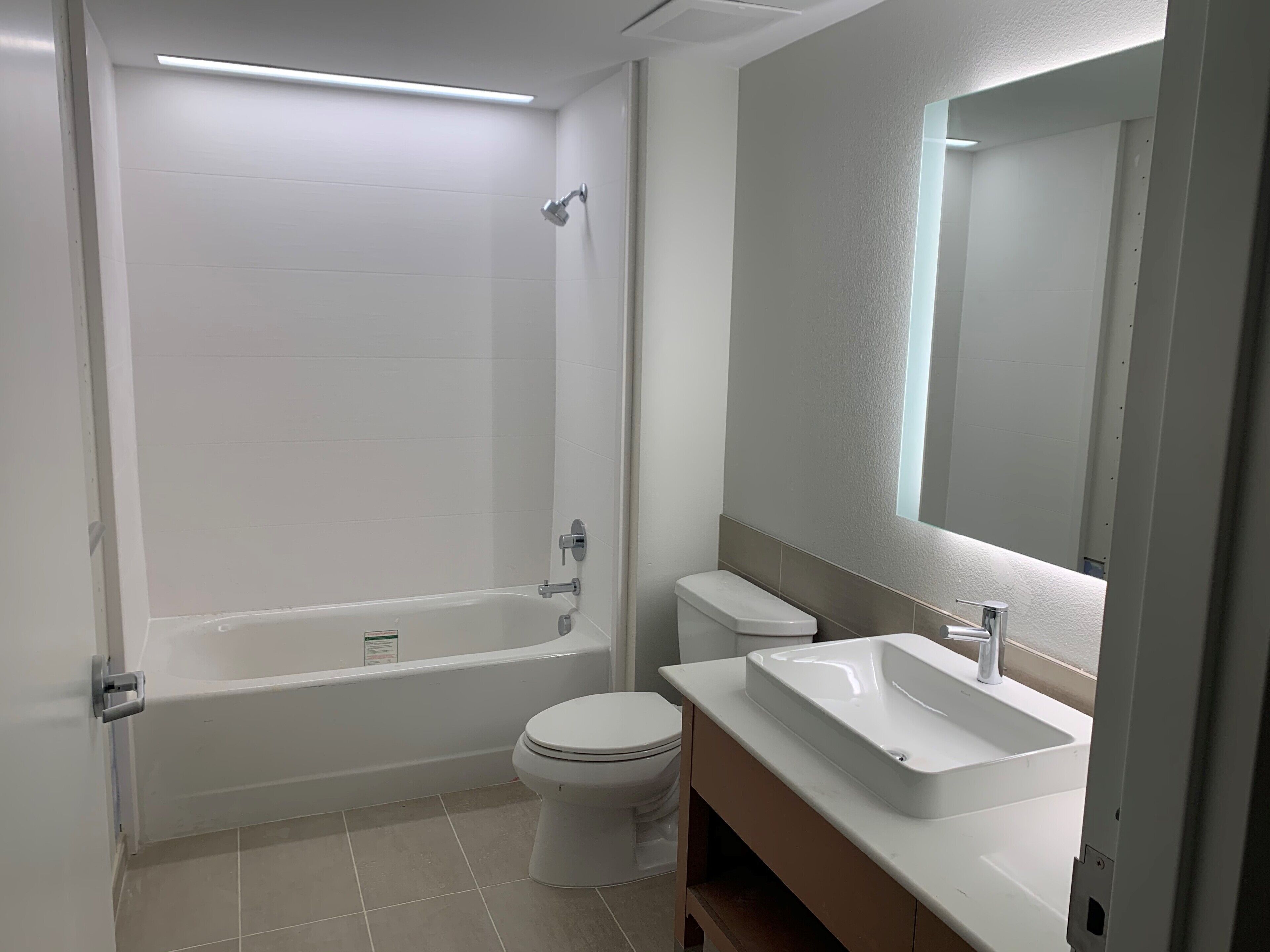 studio, 2 queen beds | bathroom | designer toiletries, hair dryer, towels, soap