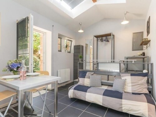 Cozy Urban Studio Near Nantes with Private Garden & Bikes