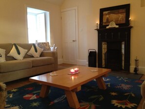 Cottage | Living room | 30-inch TV with digital channels, fireplace