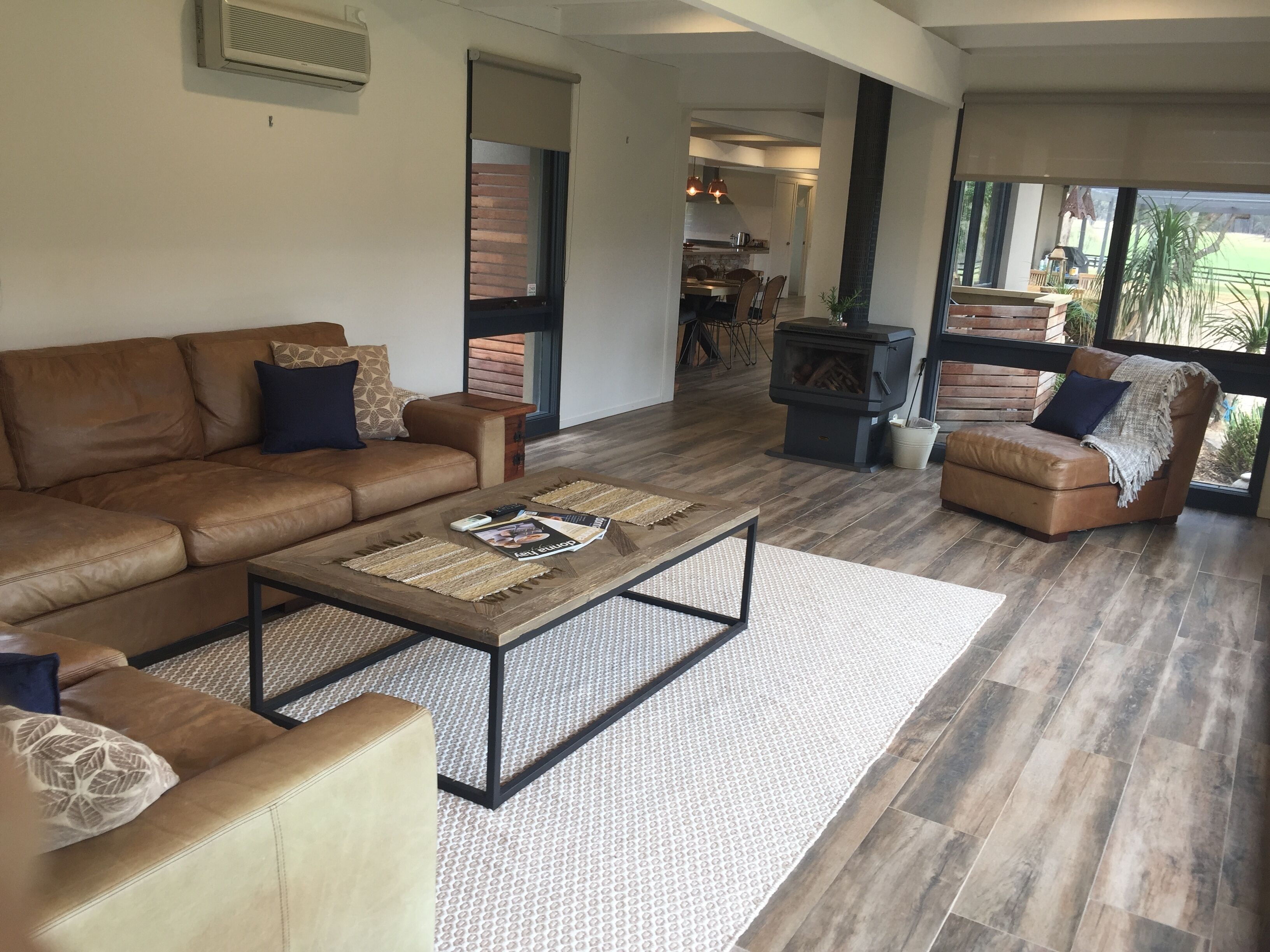 TV, fireplace, books, printers
