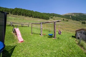 Children’s area - Apartment “Haus Fliri” in Etschtal Valley with Wi-Fi, Garden & Terrace (Graun im Vinschgau)