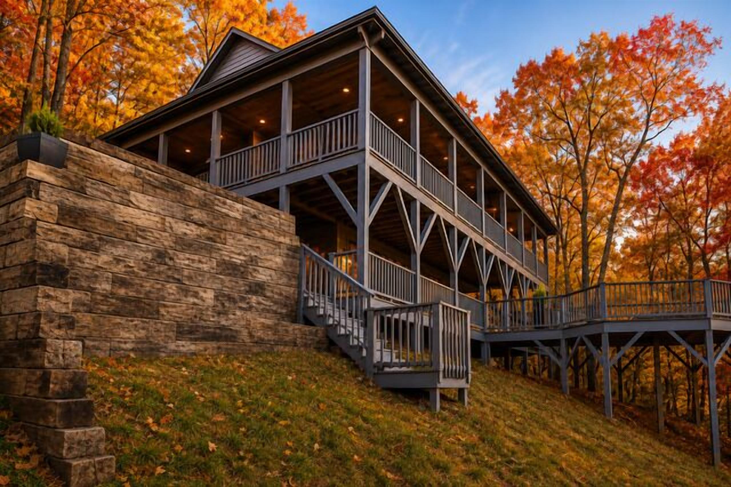 A two-story building with a balcony and a staircase leading to the upper level.