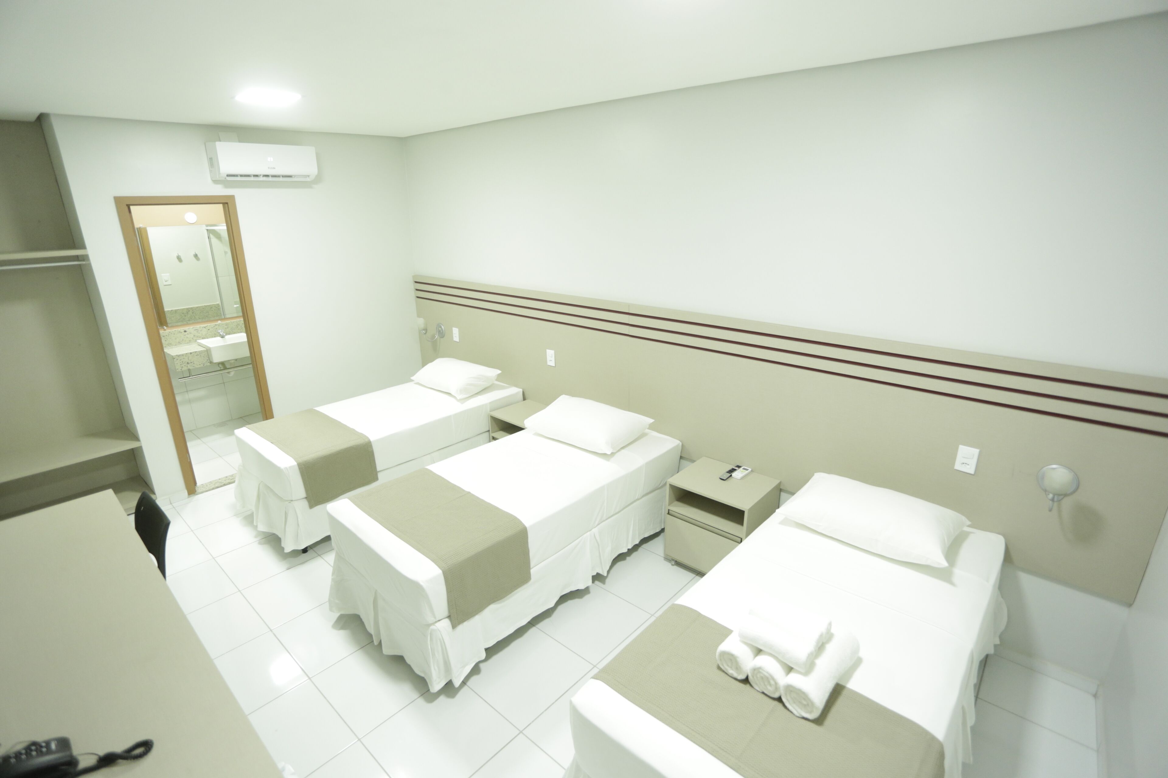 standard triple room | 1 bedroom, pillow-top beds, minibar, in-room safe