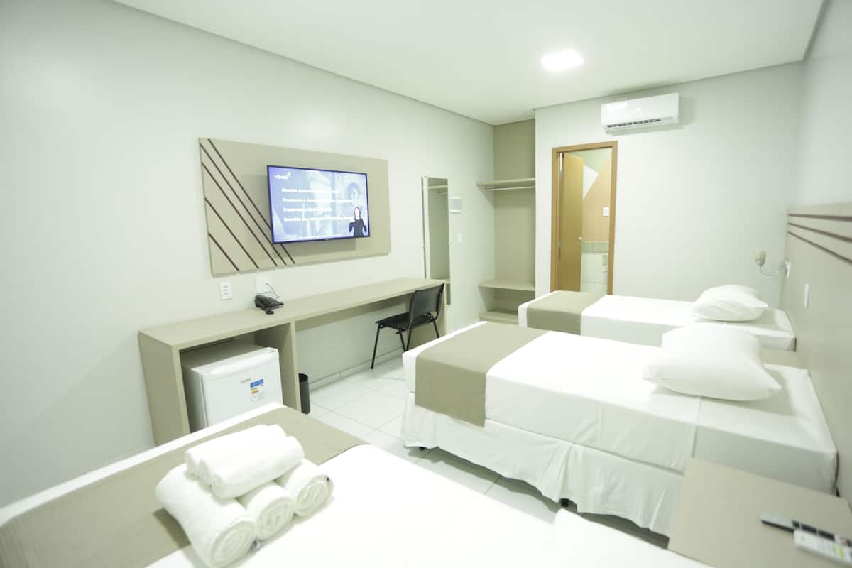 standard triple room | 1 bedroom, pillow-top beds, minibar, in-room safe