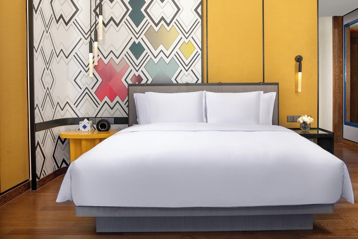 Ropa de cama de alta calidad, edredón y artículos del minibar gratis 