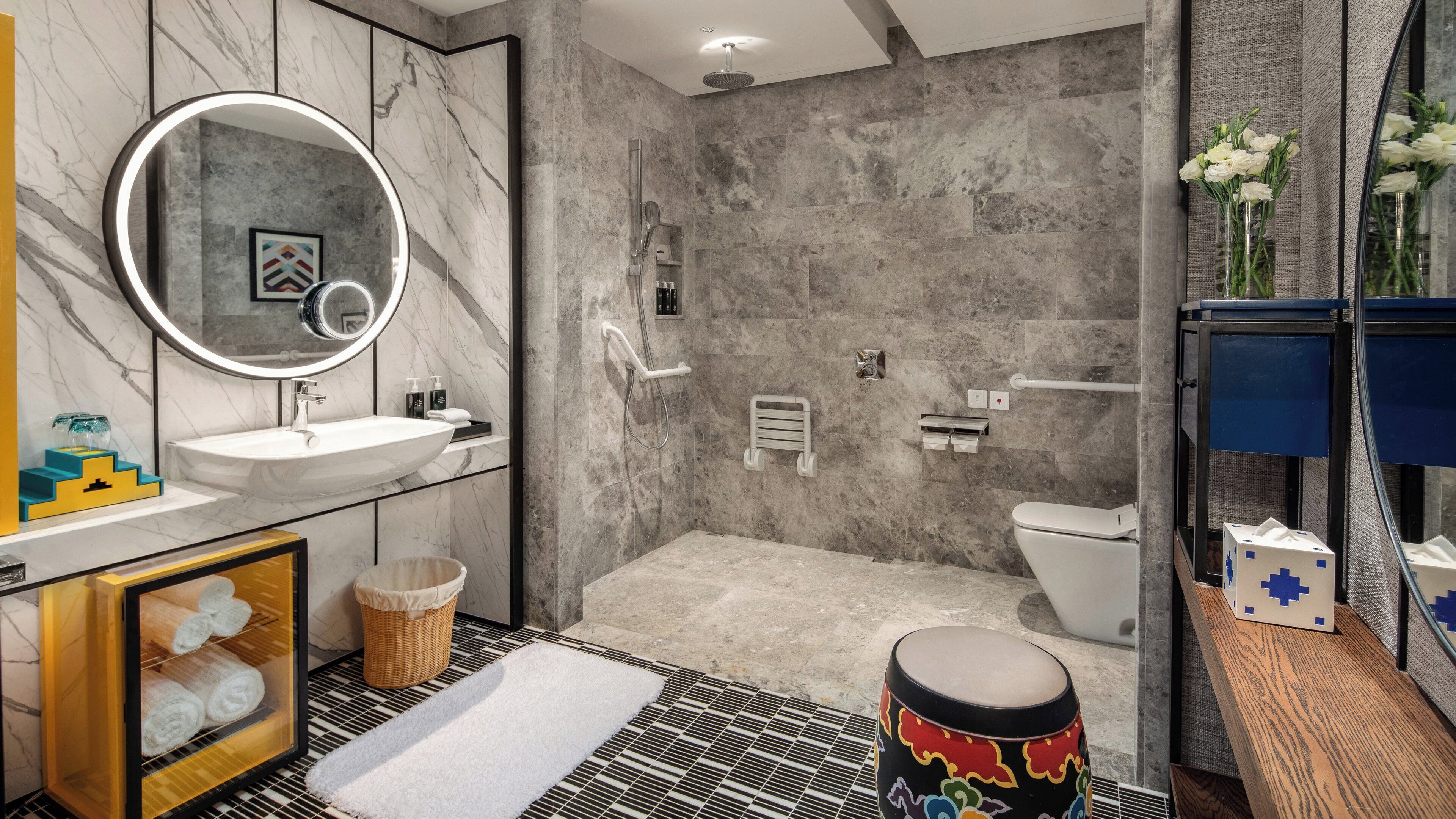 Shower, hydromassage showerhead, designer toiletries, hair dryer