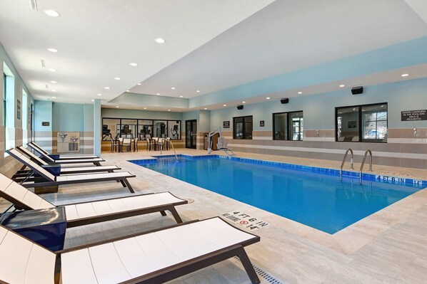 Indoor pool, open 6:00 AM to 10:00 PM, pool umbrellas, pool loungers