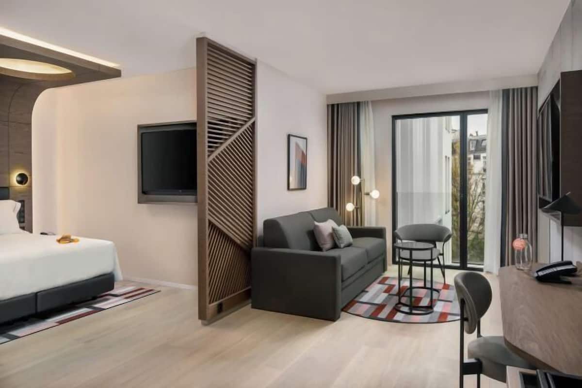 Premium bedding, memory-foam beds, minibar, in-room safe