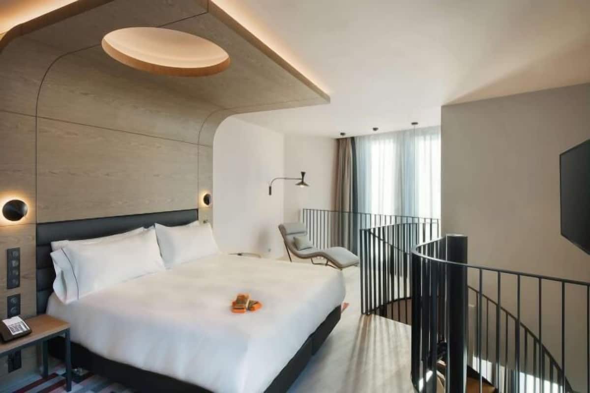 Premium bedding, memory-foam beds, minibar, in-room safe