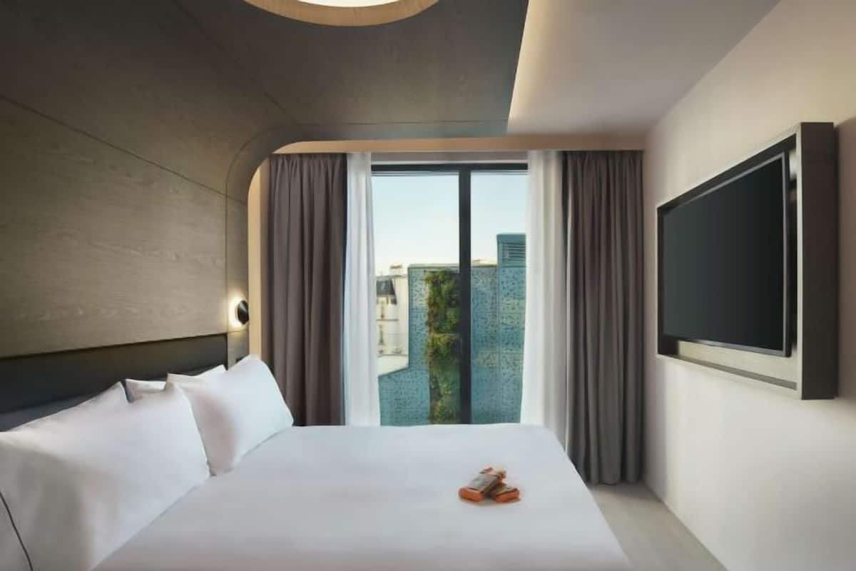 Premium bedding, memory-foam beds, minibar, in-room safe