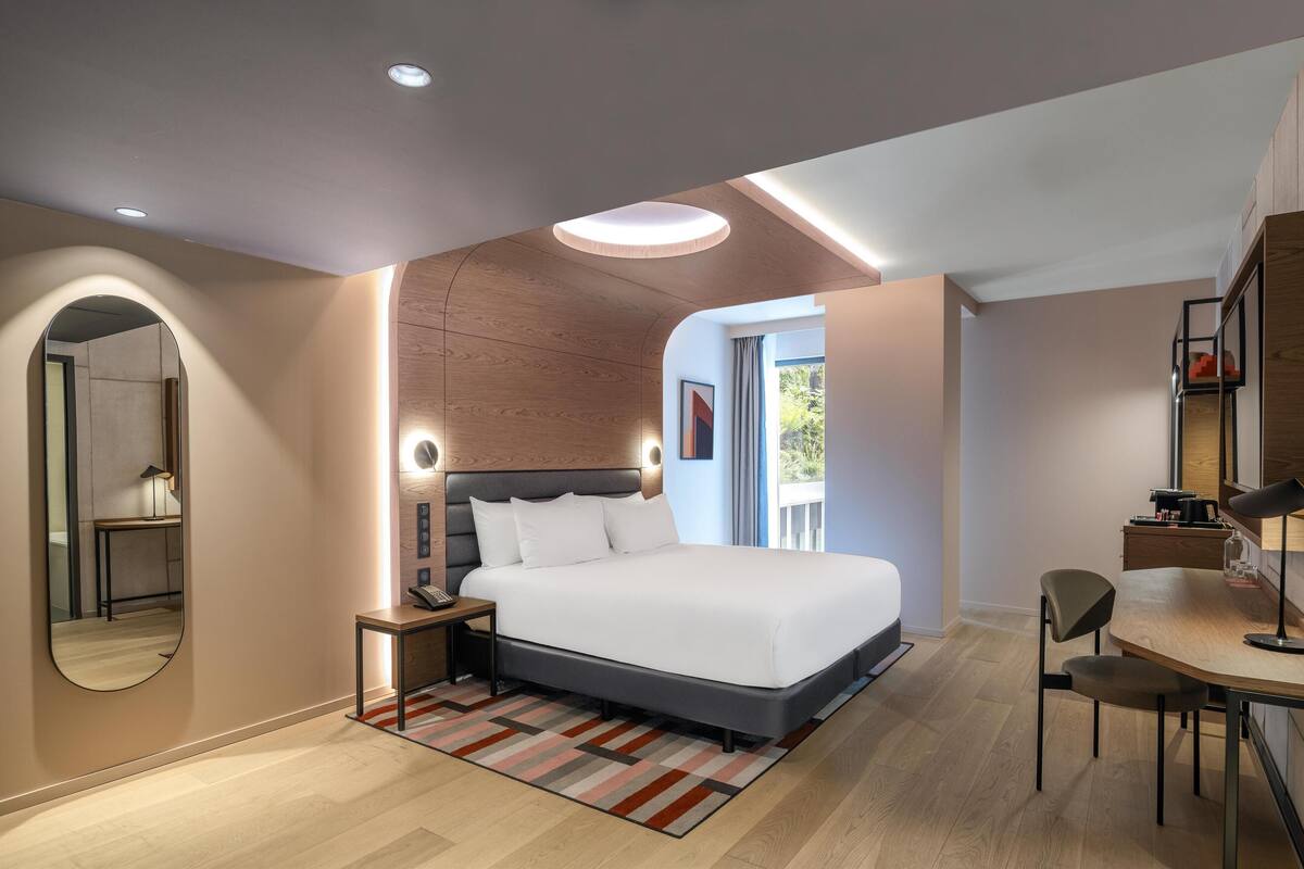 Premium bedding, memory-foam beds, minibar, in-room safe