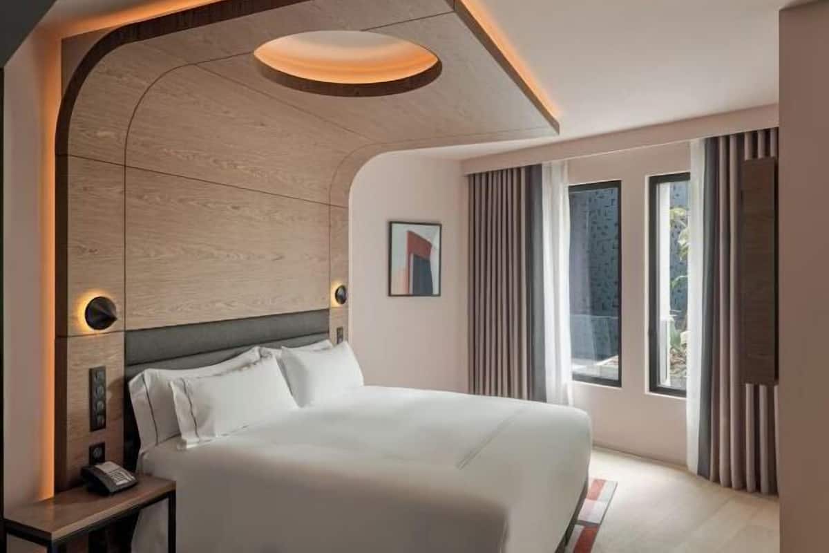 Premium bedding, memory-foam beds, minibar, in-room safe
