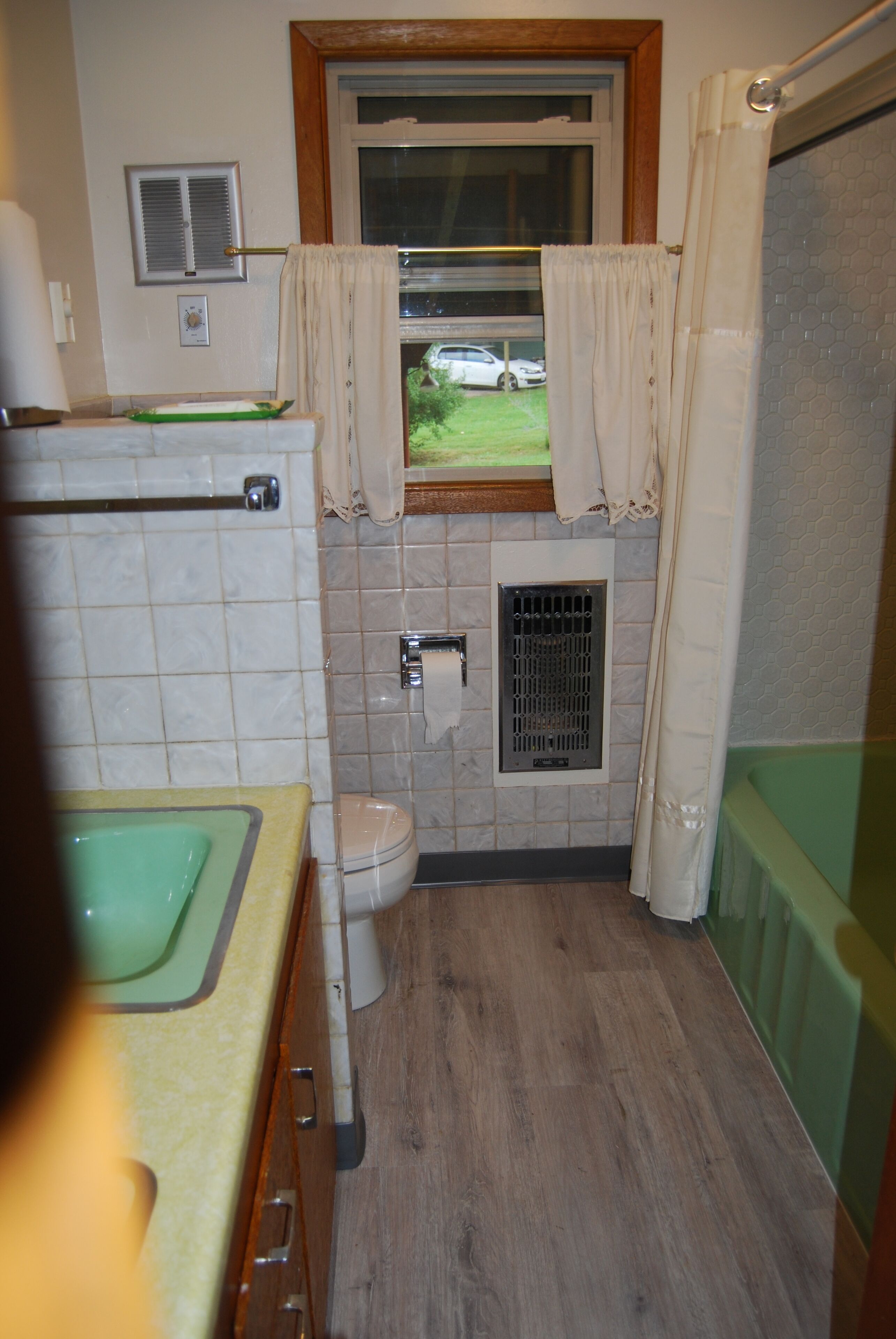 Combined shower/tub, hair dryer, towels, soap