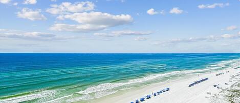 On the beach, sun-loungers