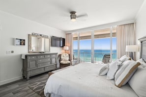Relax in this spacious room with a large bed, flat-screen TV, and balcony offering ocean views.