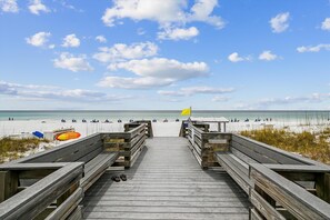 On the beach, sun-loungers
