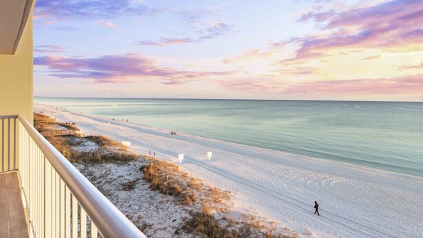 A beach view from a balcony with a railing, a sandy beach, and the ocean. - Feeling tip'Sea - Destin Gulfgate 0403! (Destin)