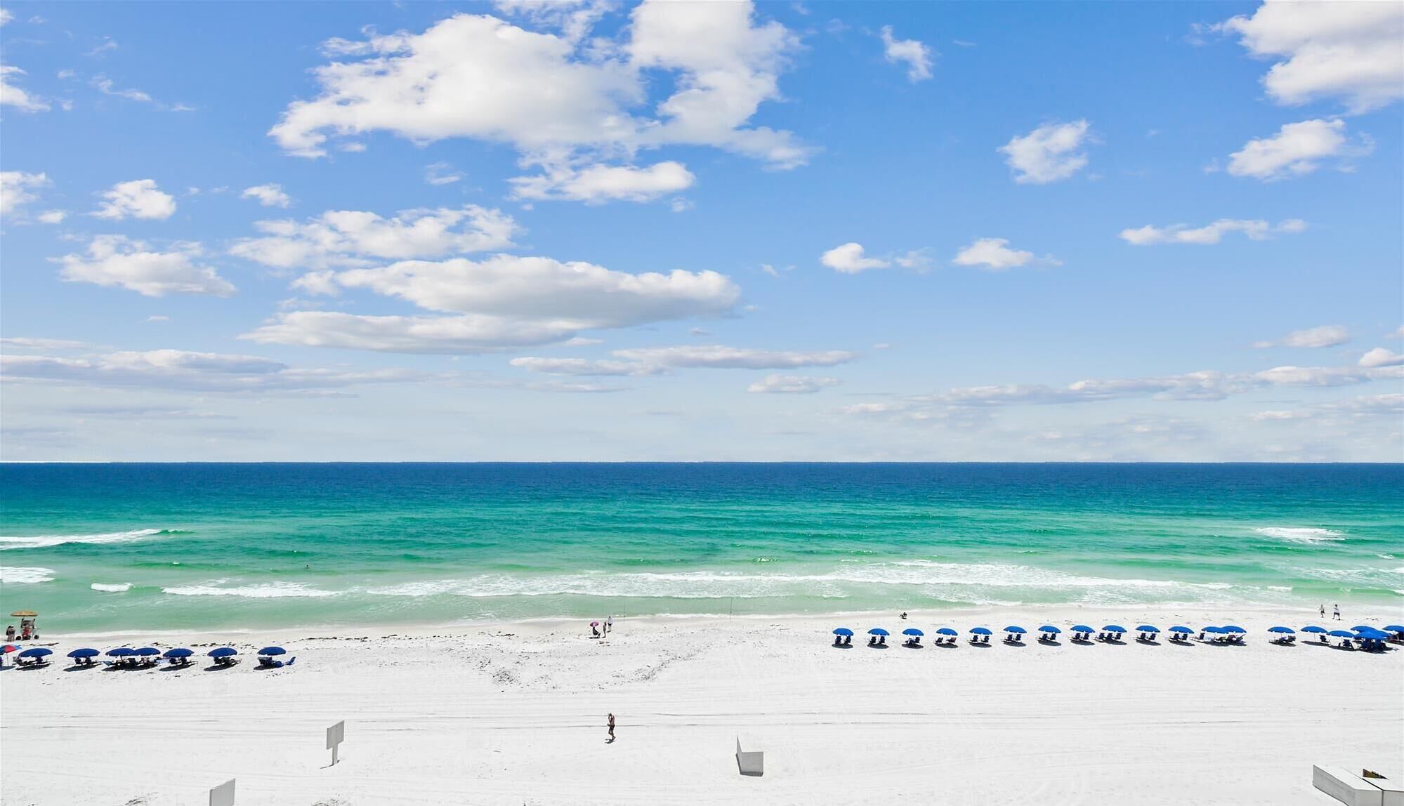 On the beach, sun-loungers