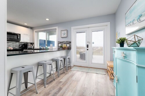 Front Bottom | Oceanfront steps from the sand!