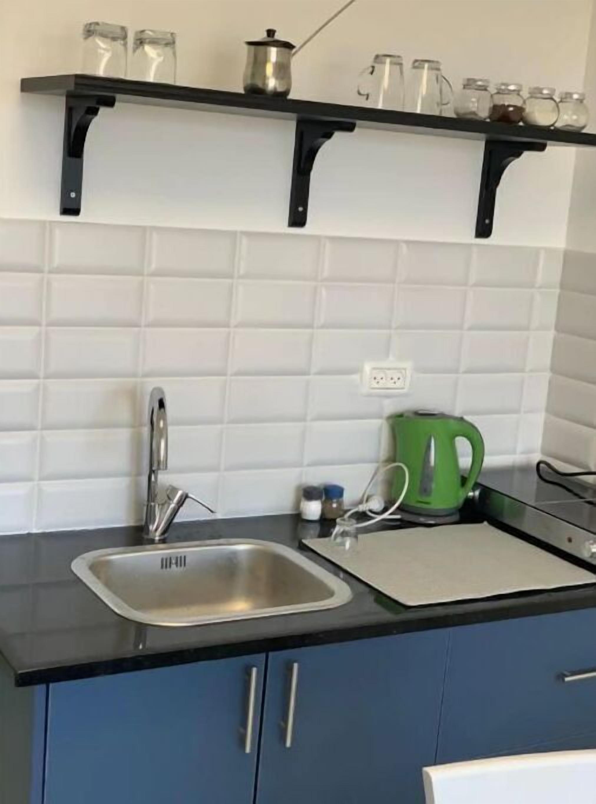 Fridge, microwave, coffee/tea maker, electric kettle