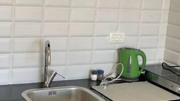 Fridge, microwave, coffee/tea maker, electric kettle