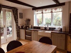 Cottage | Private kitchen | Full-size fridge, microwave, oven, stovetop