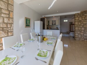 Villa | Private kitchen | Fridge, microwave, oven, stovetop