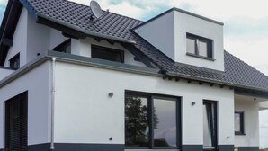 A modern two-story house with a sloped roof, large windows, and a satellite dish. - Landliebe by Interhome (Attendorn)