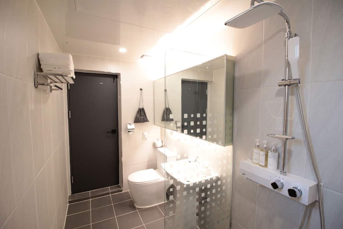 premium twin room | bathroom | free toiletries, hair dryer, bathrobes, slippers
