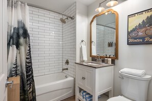 Bathtub, hair dryer, towels