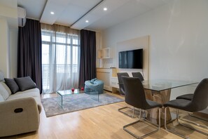 Apartamento | Área de estar | Smart TV 50 polegadas com canais digitais, TV