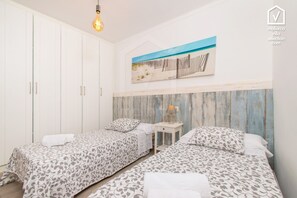 2 bedrooms, in-room safe, iron/ironing board, travel cot