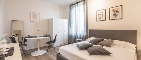 Comfort-rum | Sängtillbehör av högsta kvalitet, duntäcken och strykjärn/strykbräda