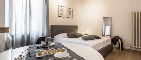Chambre Confort | Literie de qualité, couette en duvet, fer et planche à repasser