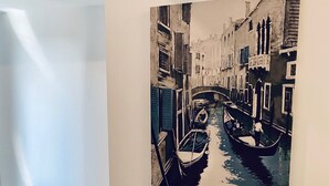 A painting of a canal scene with boats and buildings. - Maritimo 6C (Constanta)