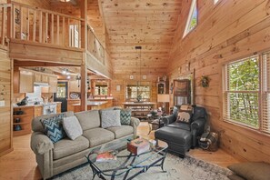 Televisio, takka, DVD-soitin, pöytätennispöytä