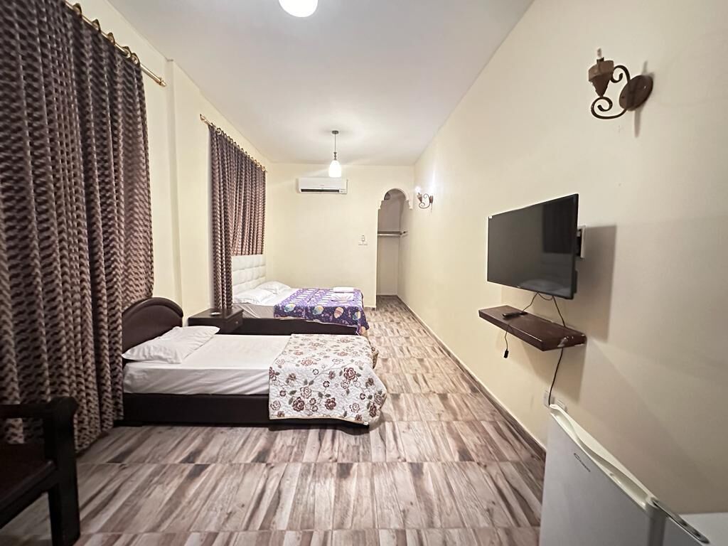 Family Double or Twin Room | Premium bedding, down comforters, memory foam beds, desk