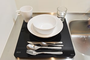 Fridge, microwave, stovetop, cookware/dishes/utensils