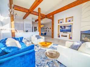Smart TV, fireplace, books, stereo