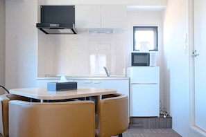 Fridge, microwave, cookware/dishes/utensils