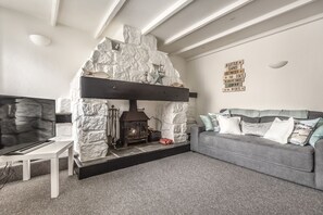 Ferienhaus | Wohnzimmer | Kamin