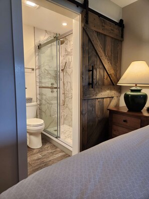 Combined shower/tub, hair dryer, towels, soap