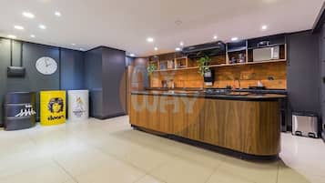 Mini-fridge, microwave, cookware/dishes/utensils