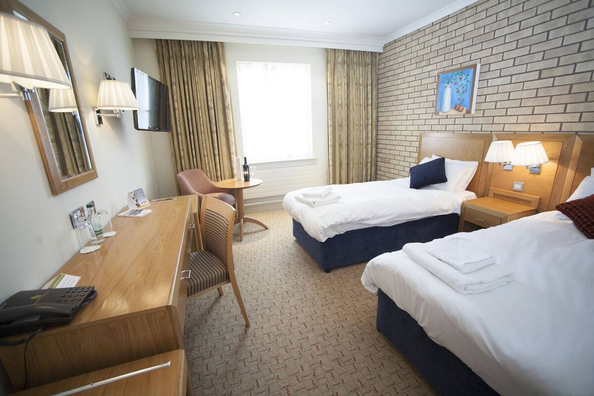 In-room safe, iron/ironing board, WiFi (free), bed sheets