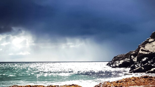A coastal scene with rocky cliffs and the ocean. - Nice home in Sandve with house sea view (Sandve)