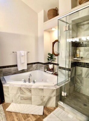 Combined shower/tub, hair dryer, towels, soap