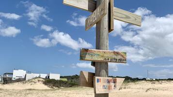 Espreguiçadeiras, toalhas de praia
