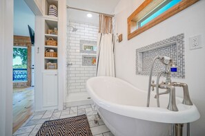 Combined shower/tub, hair dryer, towels, soap