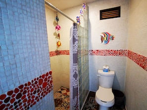 Shower, towels, soap, toilet paper