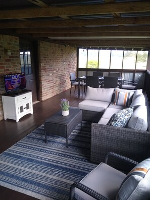 Smart TV, fireplace, books